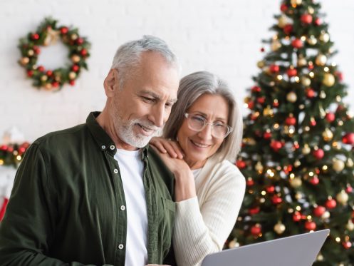 Couple looking at a laptop