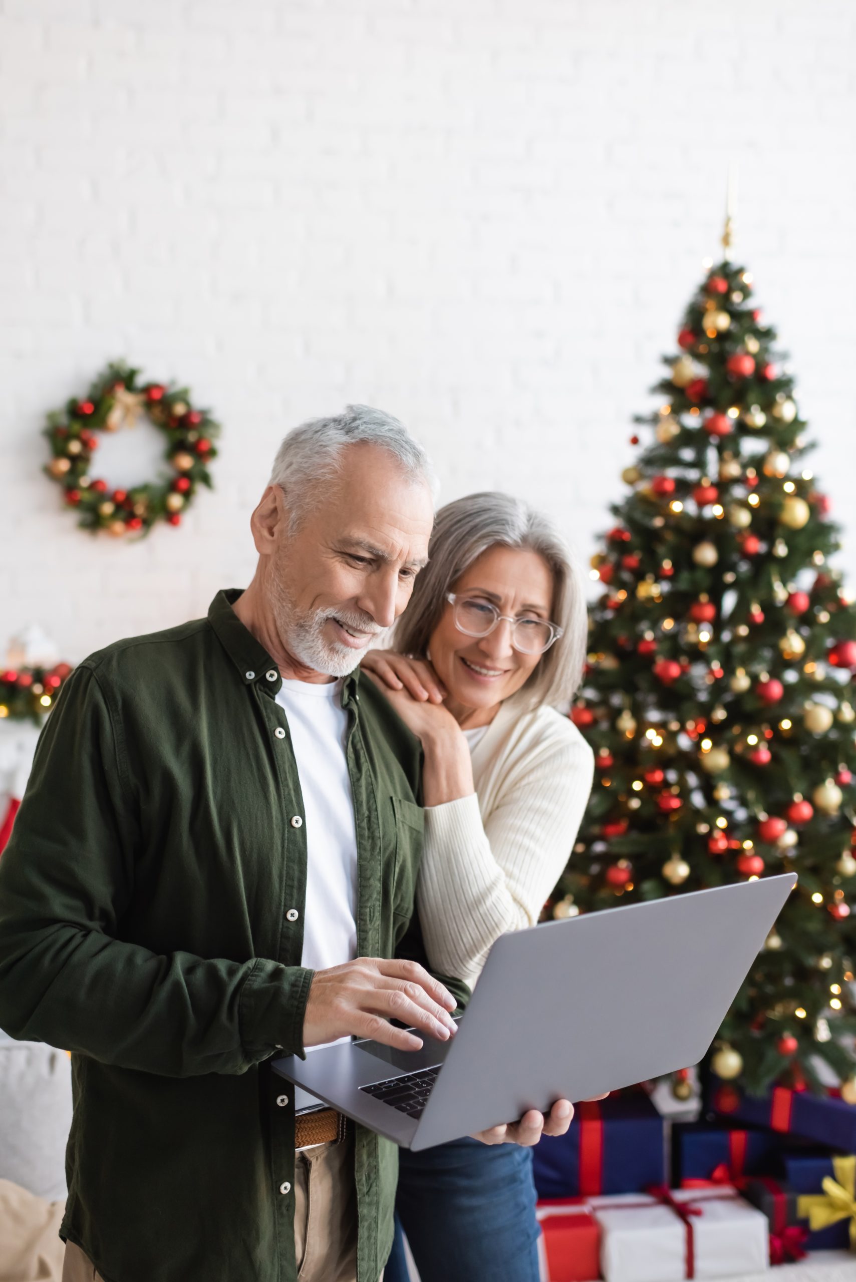 Couple looking at a laptop